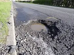 calls to repair potholes as insurance claims rise. National highways action needed.